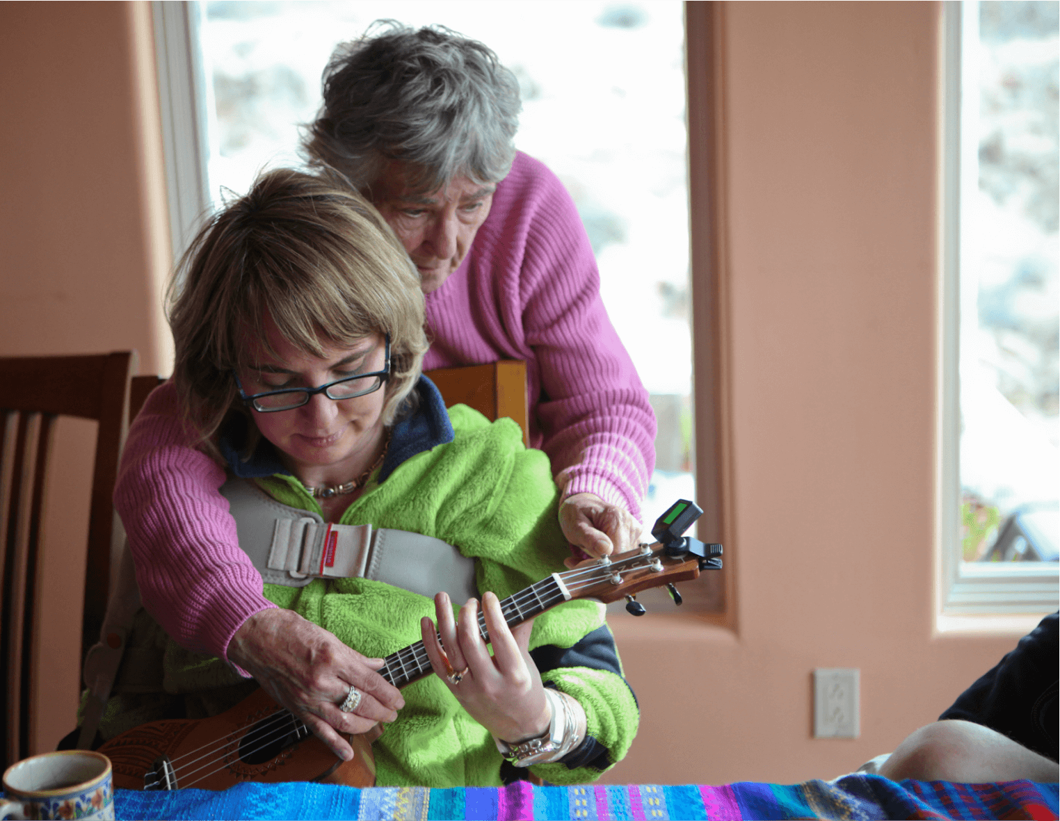 Woman teaching guitar